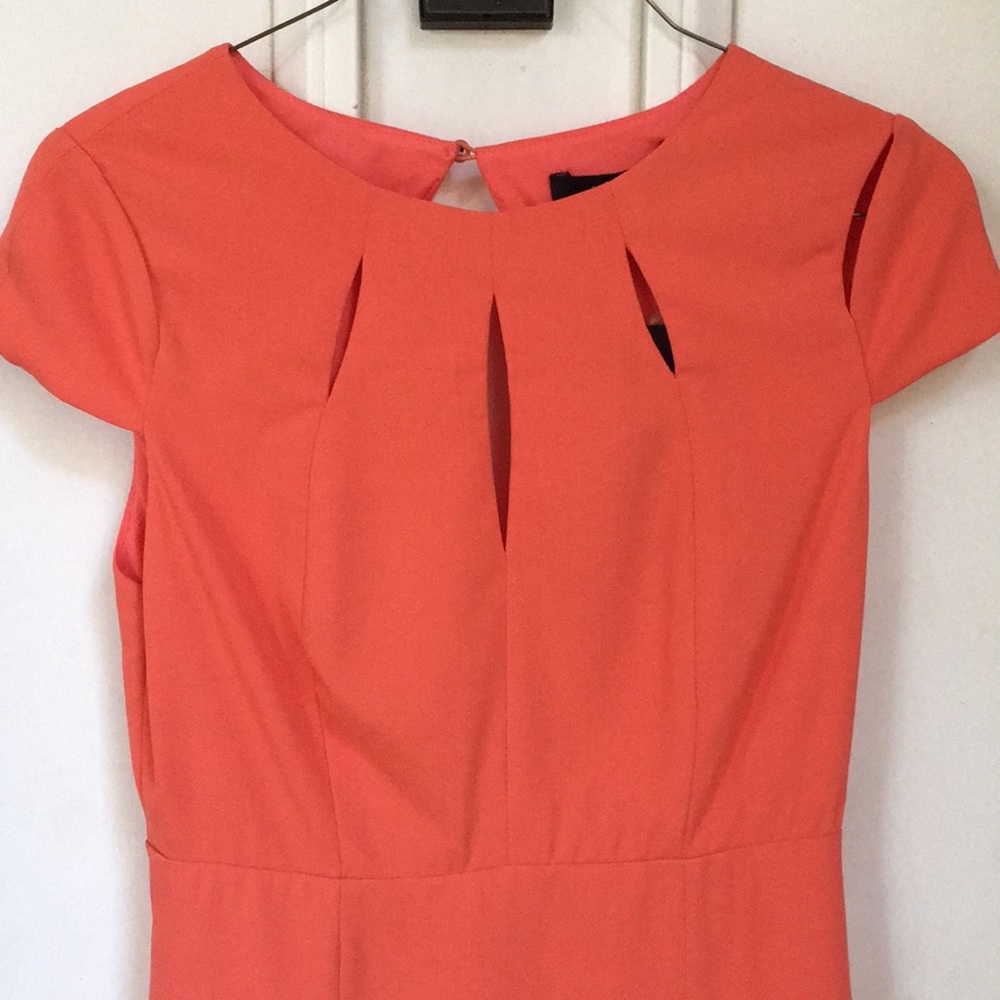 Smoking hot orange peek-a-boo cut out dress